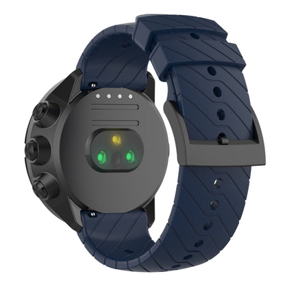 Midnight blue silicone watch strap with textured segments and metal buckle slots