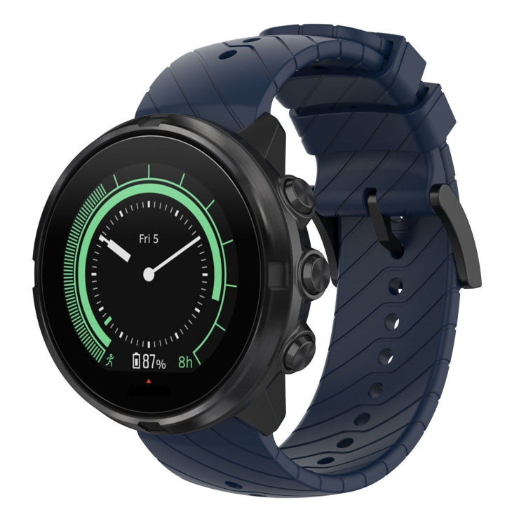 Midnight blue silicone watch strap with metal lugs and textured surface