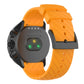 Amber yellow silicone watch strap with textured segments and metal buckle