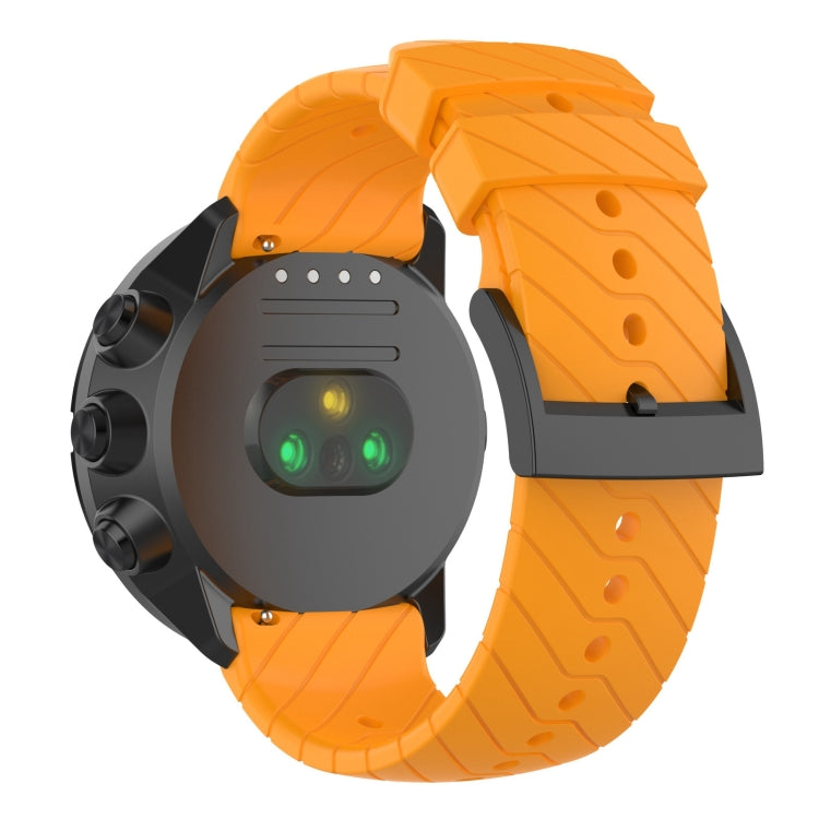 Amber yellow silicone watch strap with textured segments and metal buckle