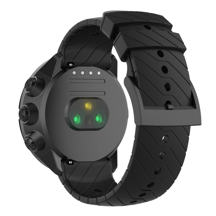 Black silicone watch strap with textured segments and metal buckle