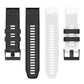 Two-tone silicone watch band shown in black and white with metal buckle