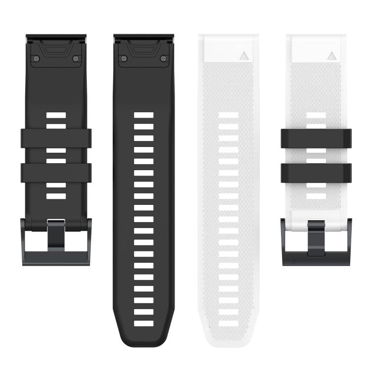 Two-tone silicone watch band shown in black and white with metal buckle