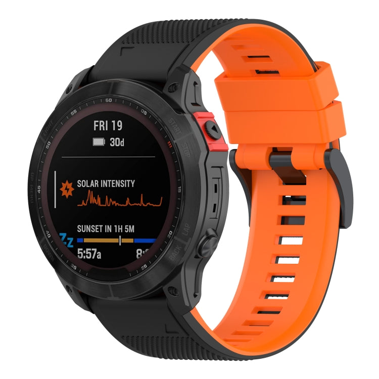 Two-tone silicone watch band with orange outer strap and black inner connector
