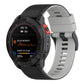Two-tone silicone watch band with white and black strap, ridged texture and buckle