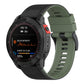 Two-tone silicone watch band with green and black strap, ridged texture and buckle