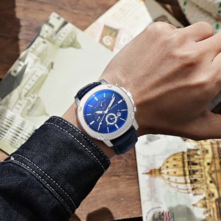 Men's quartz business watch with blue dial, silver case, and dark leather strap