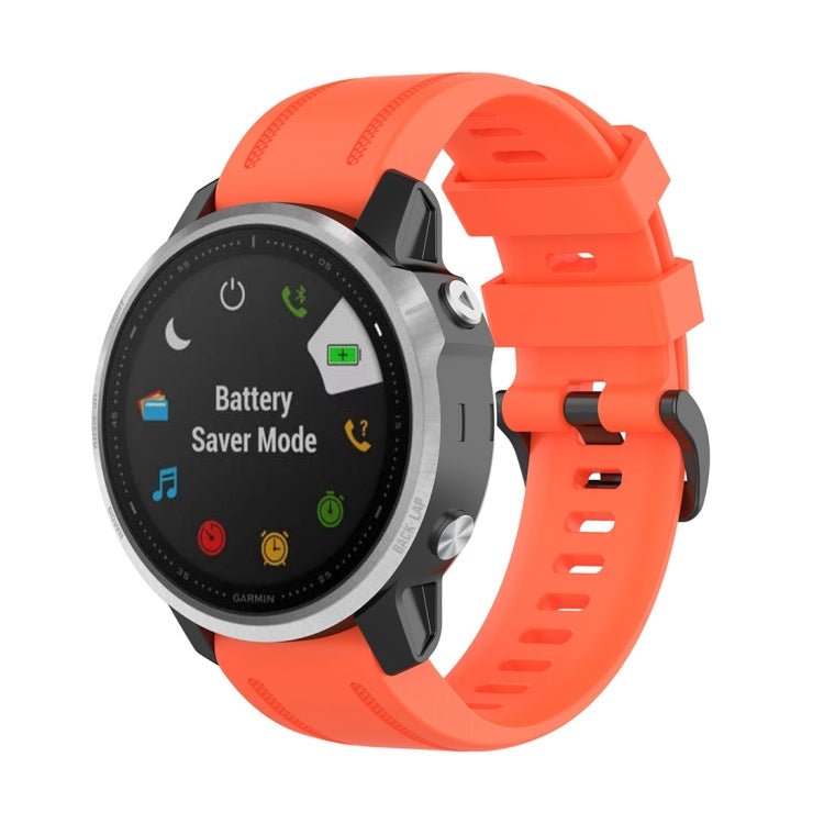 Textured 20mm quick-release watch strap with plastic button, orange silicone band