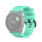 Quick-release watch wrist strap with plastic buckle, light teal textured silicone band.