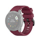 Quick-release watch wrist strap with plastic buckle, burgundy textured silicone band.