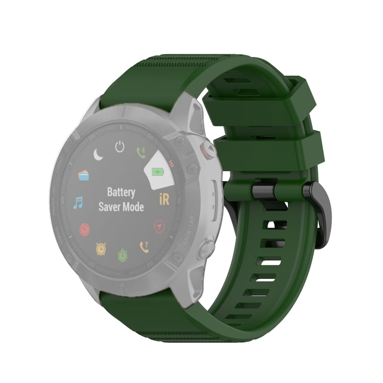 Quick-release watch wrist strap with plastic buckle, dark green textured silicone band.