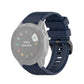 Textured quick-release wrist strap with plastic button, dark blue band.