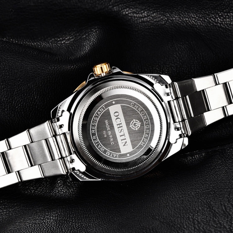 Stainless steel watch caseback with engraved text and ridged crown area.