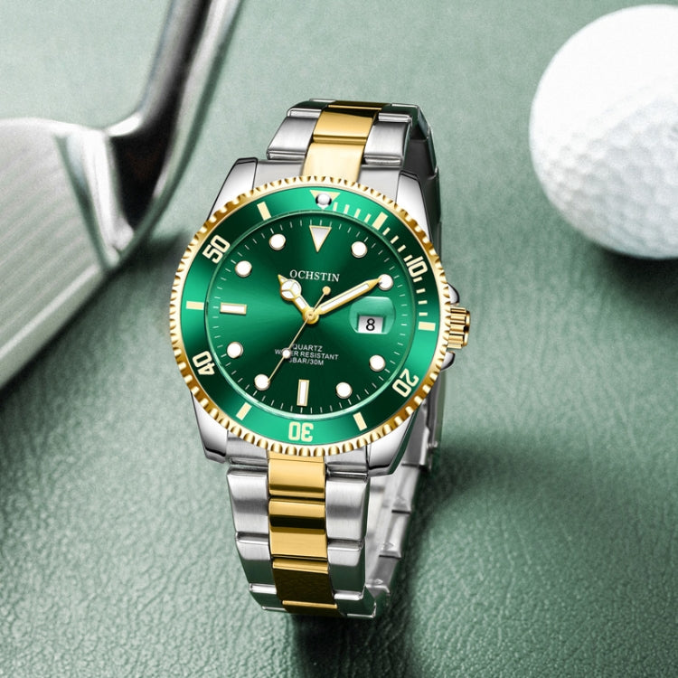 Two-tone stainless steel quartz watch with green dial, gold bezel, and date window.