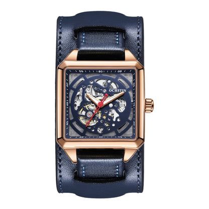 Rose gold skeleton mechanical watch with blue leather strap and visible gear dial