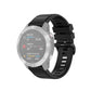 Black 22mm textured watch strap with plastic quick-release buckle, front view