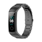Black three-bead steel watchband with connected fitness tracker display