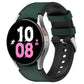 Olive green silicone watch band with silver-tone metal buckle and perforations.