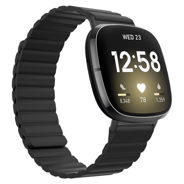 Black silicone magnetic watch band with ridged links for smartwatch.