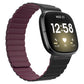 Wine red silicone magnetic watch band with ridged strap and black clasp end.