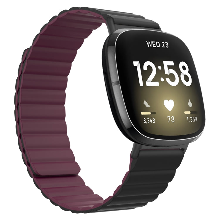 Wine red silicone magnetic watch band with ridged strap and black clasp end.