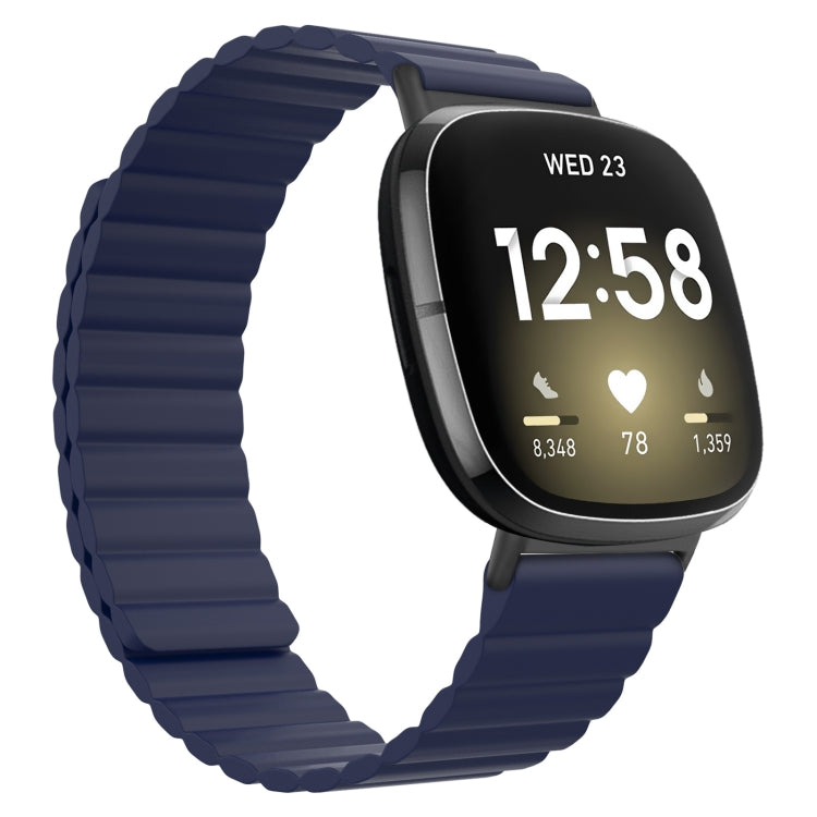 Navy blue silicone magnetic watch band with gray clasp, shown on smartwatch with black screen