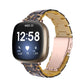 Hawksbill-style resin watch band with two-tone links and metal clasp