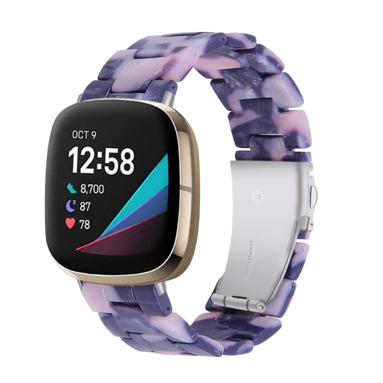 Purple patterned resin watch band with a smartwatch display showing 12:58