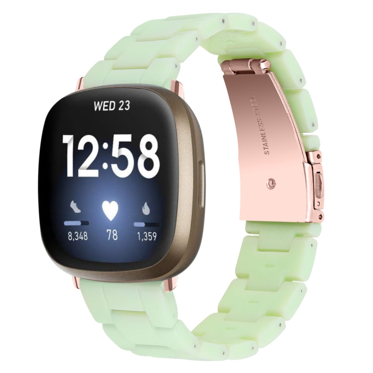 Light green resin watch band with rose-gold clasp and smartwatch display