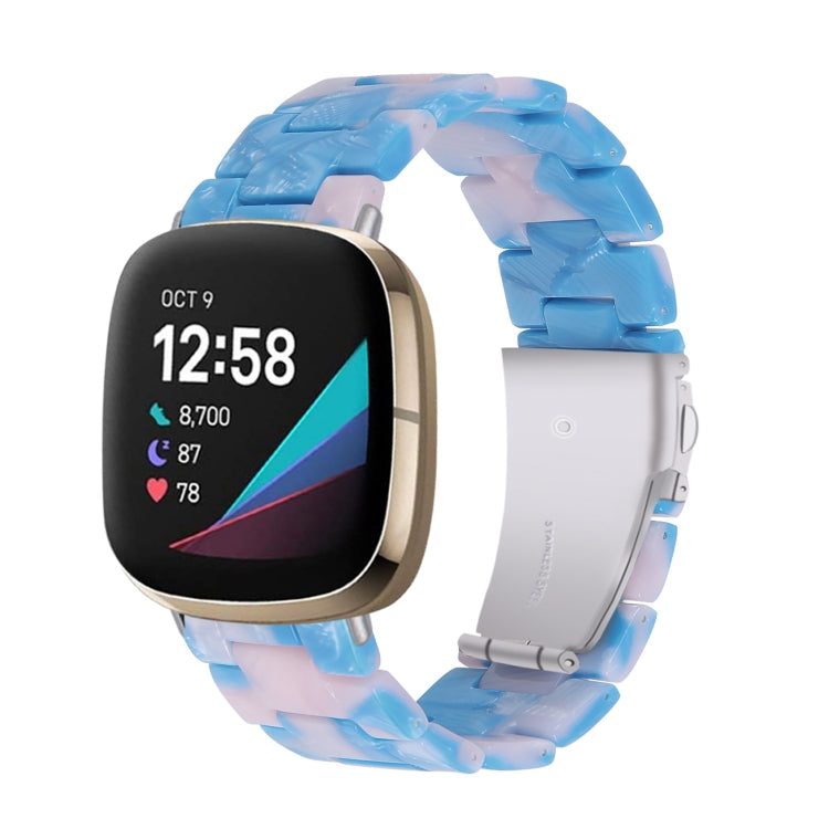 Blue resin watch band with molded links and translucent look, compatible with Fitbit Versa