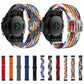 Two multicolor braided nylon watch bands with rectangular buckle on black smartwatch cases