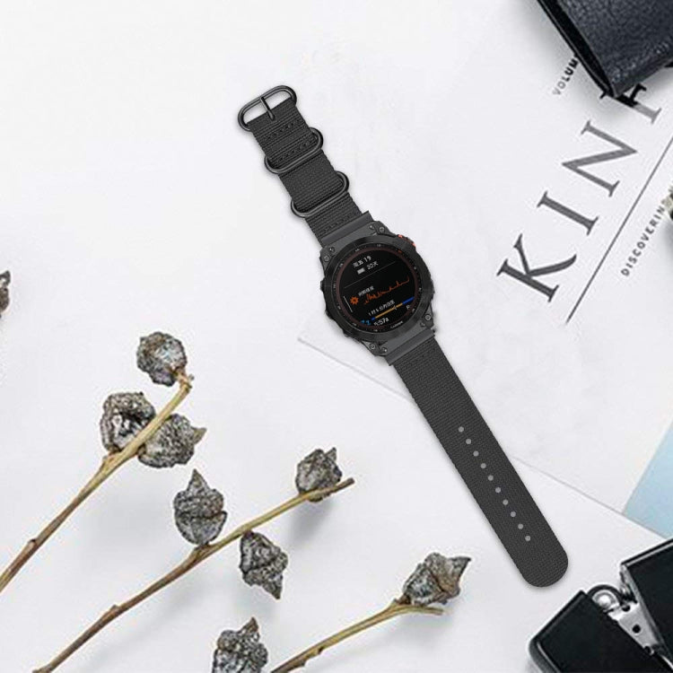 Black nylon watch band with three-ring steel buckle and adjustable strap holes