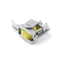 Sewing machine presser foot with spring and yellow-green wheel under silver housing