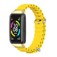 Yellow silicone breathable watch band with perforated links and metal clasp for smart watch