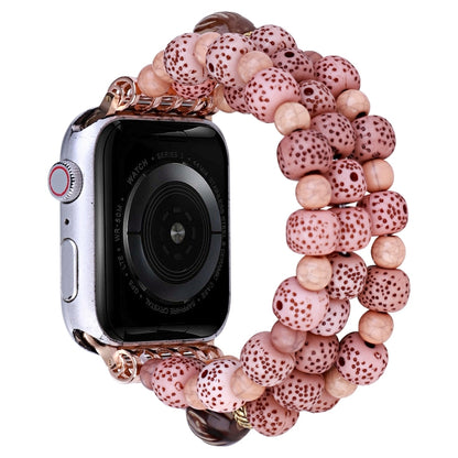 Pink beaded watch band with rose-gold clasp and speckled beads