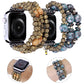 Pair of bead watch bands: rose-wood and blue speckled styles on Apple Watch frames