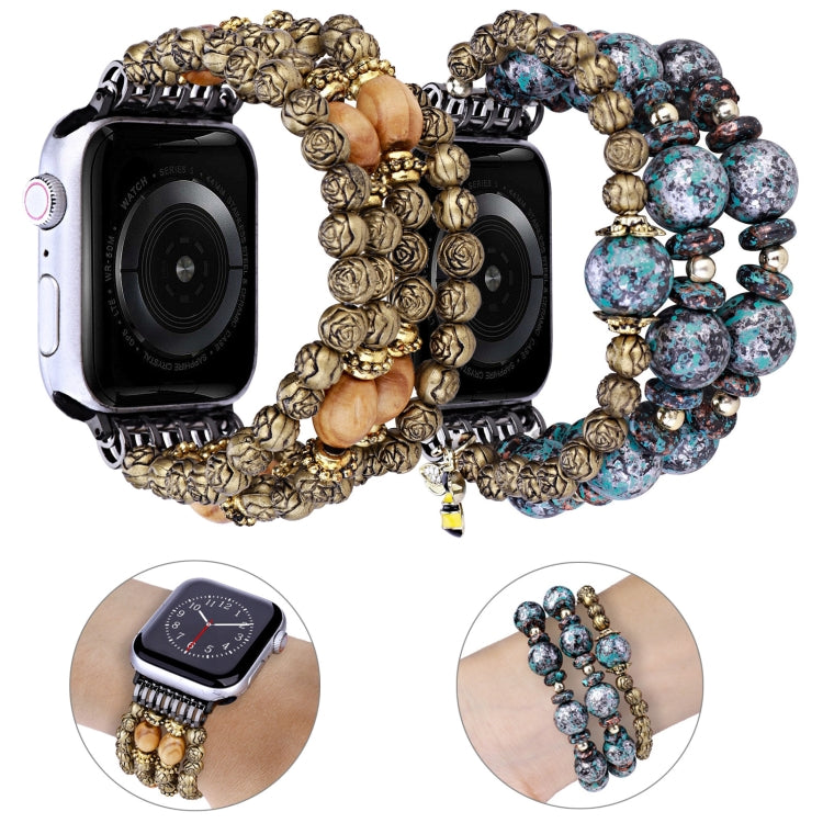 Pair of bead watch bands: rose-wood and blue speckled styles on Apple Watch frames