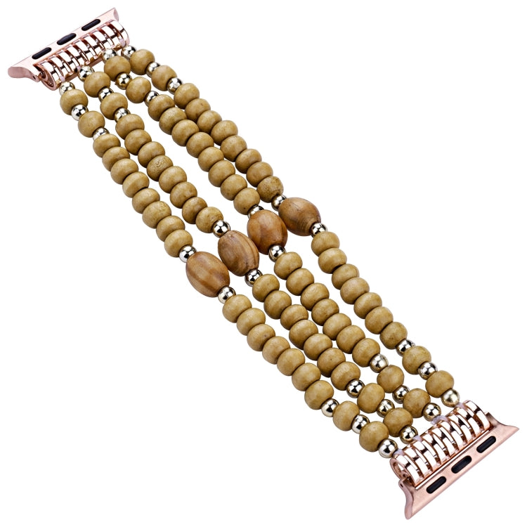 Wood bead watch band with silver accents, multi-row tan beads with brown oval pieces.