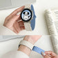 Blue silicone magnetic watch band with clasp, plus matching light-colored band