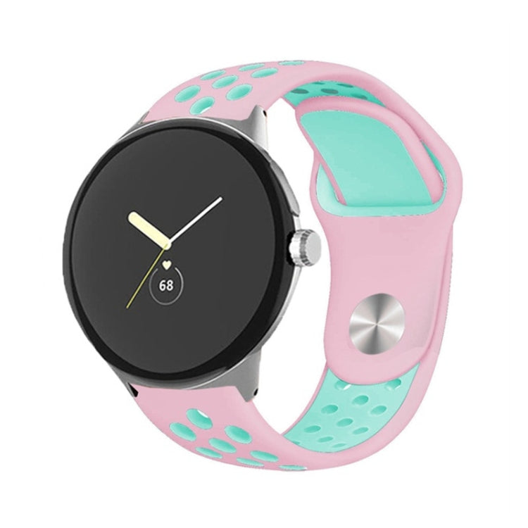 Two-color reverse buckle silicone watch band, pink and teal with paw-print accents