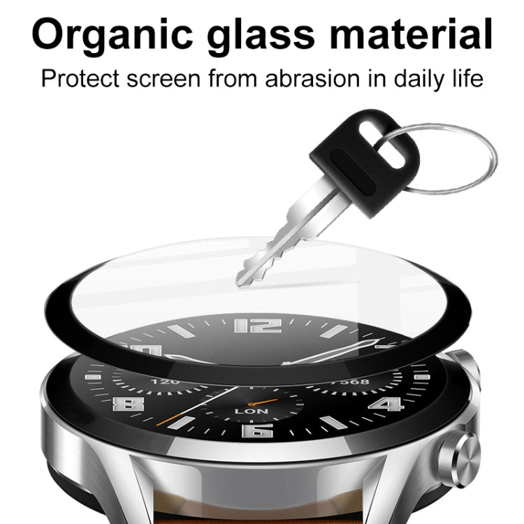 Transparent watch protective film sheet over watch face, black bezel edges