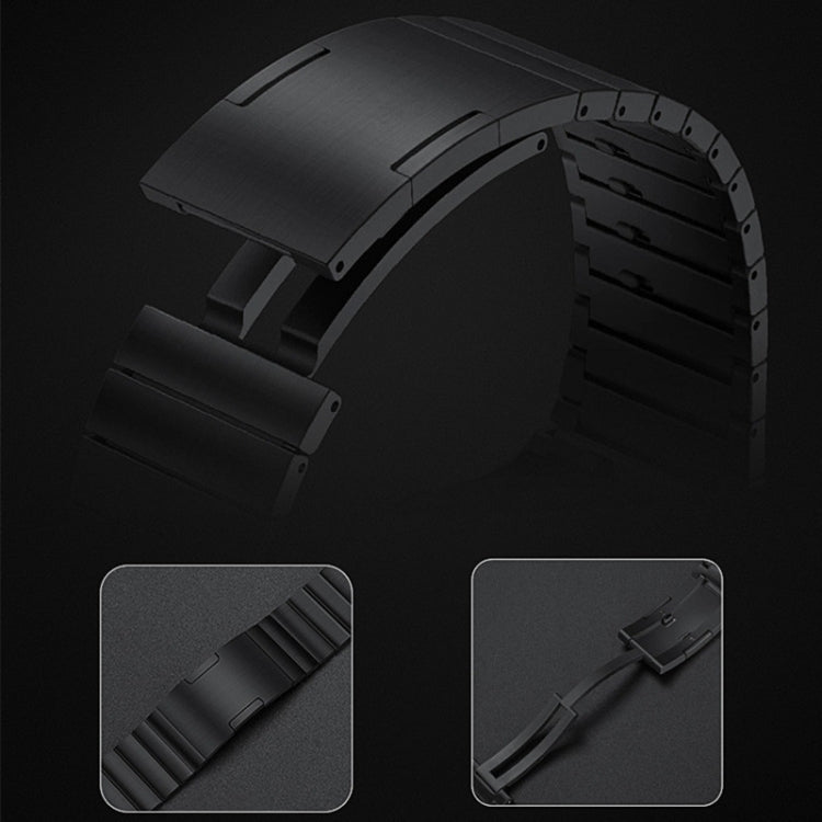 Black stainless steel watch band end pieces and segmented metal link close-up