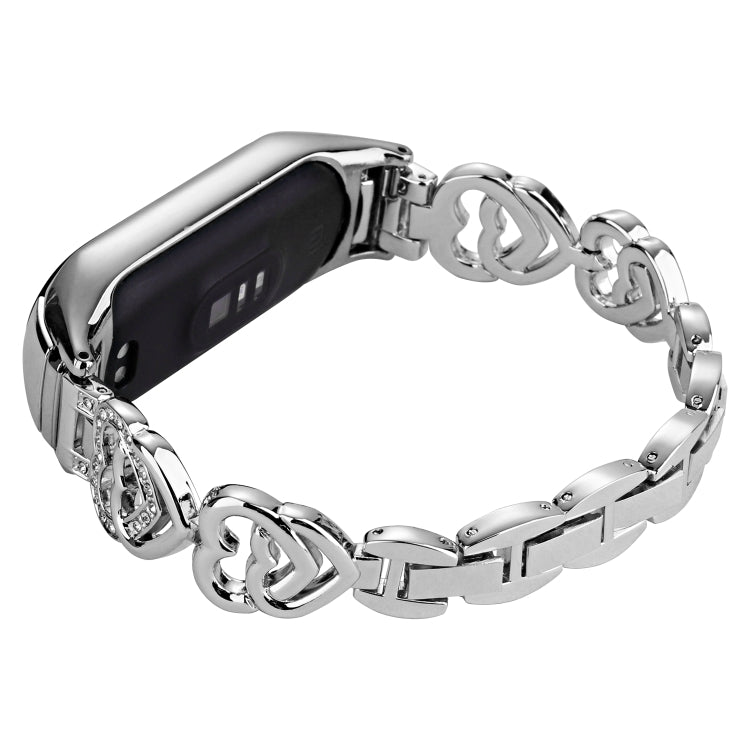 Silver diamond metal watch band with chain links and secure clasp