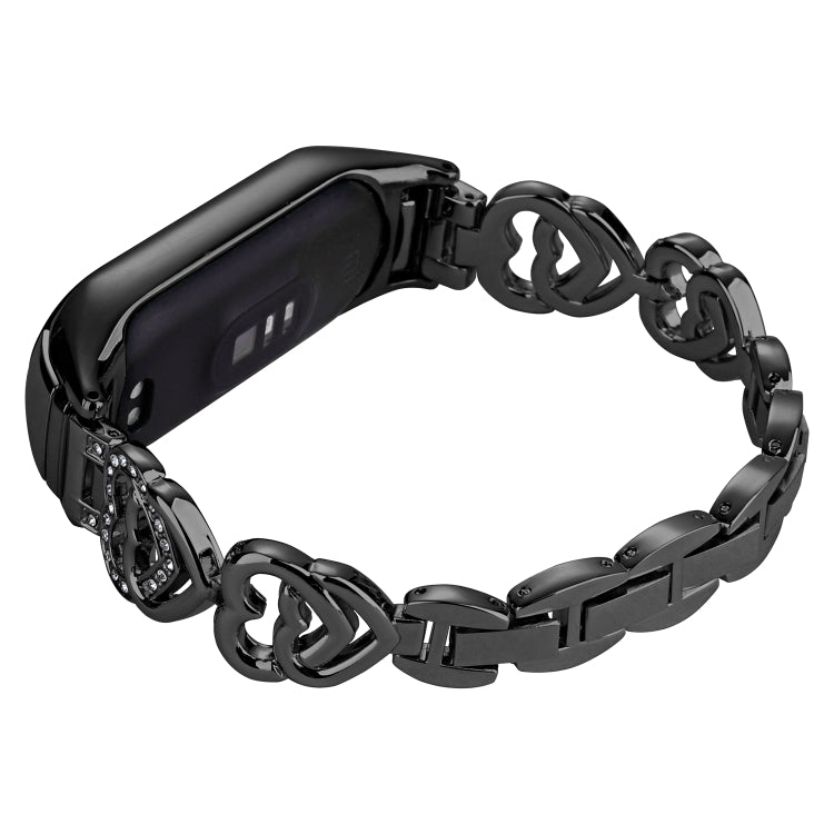 Black diamond metal watch band with sparkling oval diamond centerpiece and clasp