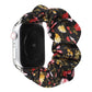 Cloth hair ring Apple Watch band with black base and colorful floral pattern