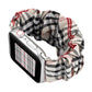 Cloth Apple Watch ring watchband, close-up plaid cloth band with red line detail