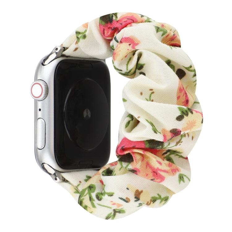 Cloth hair ring Apple Watch band with cream floral print, green leaves, and pink accents