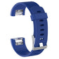 Dark blue silicone wrist strap with buckle, angled view showing textured hole pattern