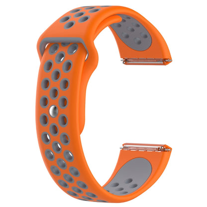Orange and gray two-tone silicone watchband with oval cutout pattern and metal buckle.