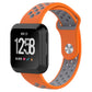 Orange and gray silicone watchband on smartwatch display with black screen and date/time.